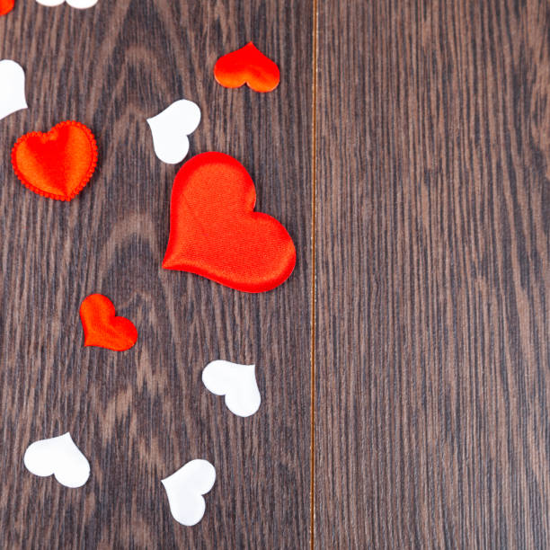 istock Red hearts on a wooden background. 1190192080