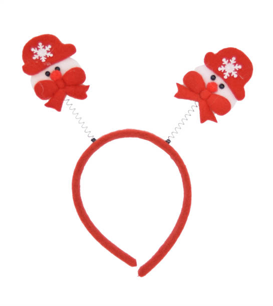 istock Isolated christmas headband with snowman in red cap 1190192862