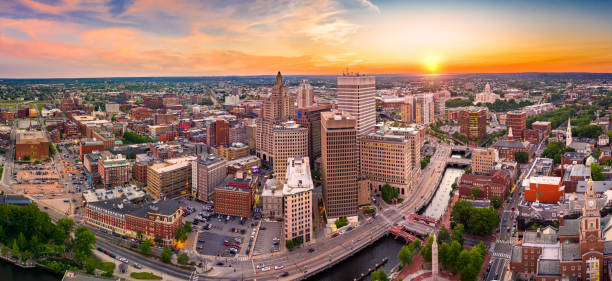 Aerial panorama of Providence, Rhode Island Aerial panorama of Providence skyline at sunset. Providence is the capital city of the U.S. state of Rhode Island. Founded in 1636 is one of the oldest cities in USA. providence rhode island photos stock pictures, royalty-free photos & images