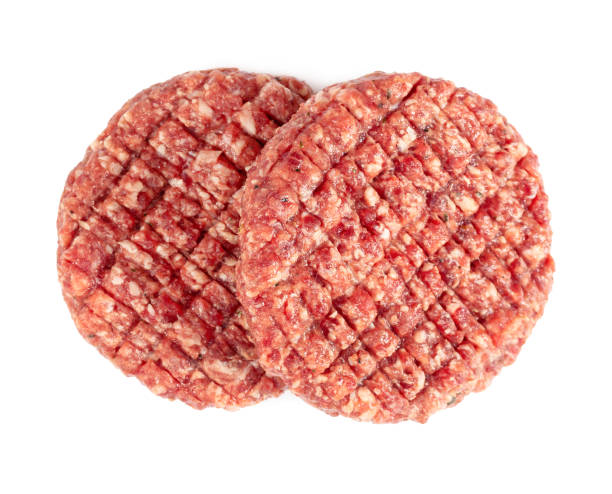 istock Two raw burger meat isolated on white 1190194596