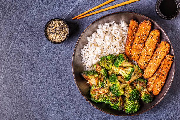 istock Fried tempeh with rice and broccoli 1190195360