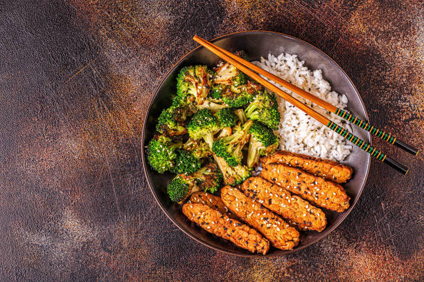 istock Fried tempeh with rice and broccoli 1190195401