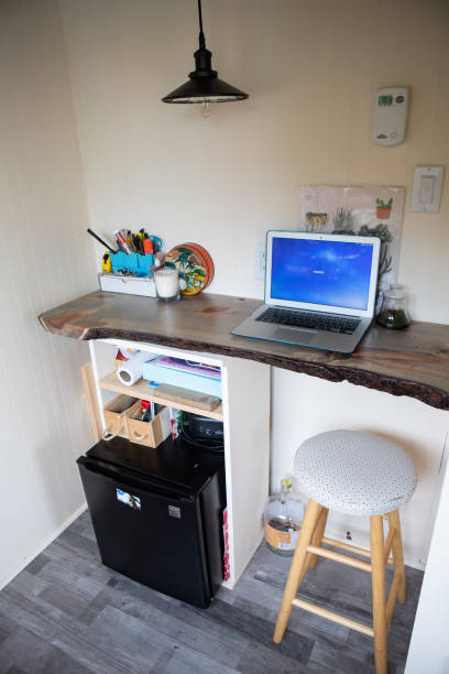 istock Funky girl shows off her DIY Tiny Home 1190195493