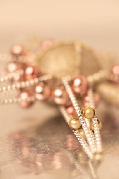 silver-gold Christmas ornament with corals