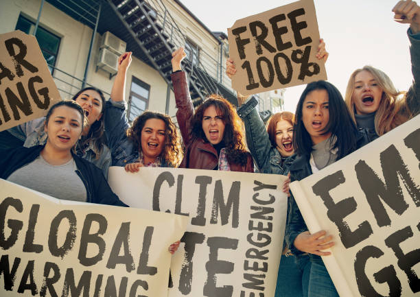 istock Young people protesting of climate emergency on the street 1190197939