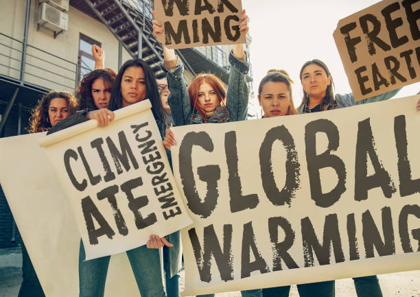 istock Young people protesting of climate emergency on the street 1190197947