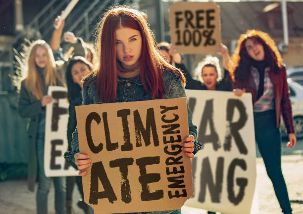 istock Young people protesting of climate emergency on the street 1190197956