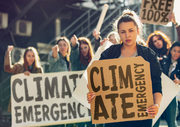 istock Young people protesting of climate emergency on the street 1190197965