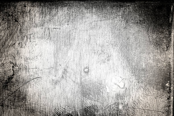 istock Scratched dirty dusty copper plate texture, black and white image. 1190200544