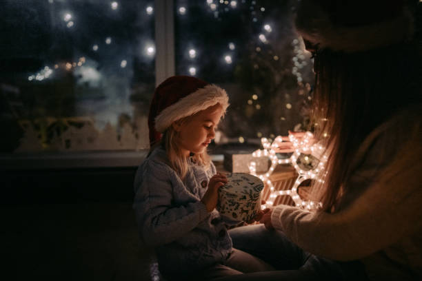 istock Opening Christmas presents together 1190200584