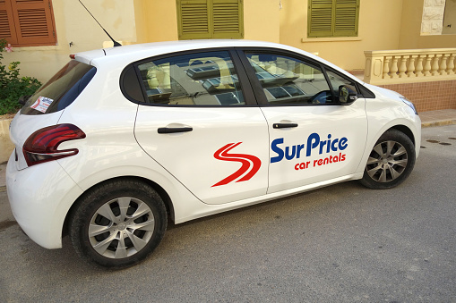 Marsalforn, Malta - October 23, 2019: Surprice Car Rentals vehicle, a Maltese car hire company