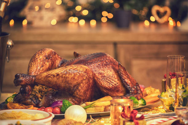 istock Traditional Stuffed Christmas Turkey with Side Dishes 1190203372