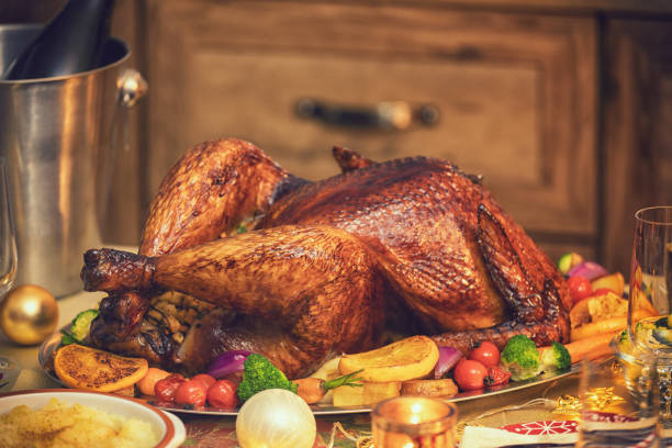 istock Traditional Stuffed Christmas Turkey with Side Dishes 1190203387