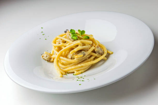 Spaghetti with cheese and pepper with clams