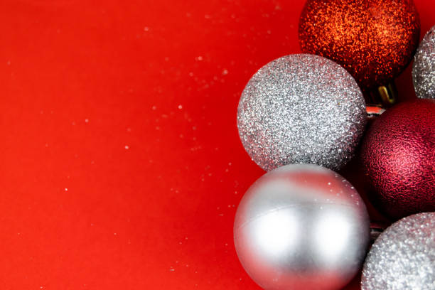 istock Silver and Red baubles Christmas Tree baubles 1190209905