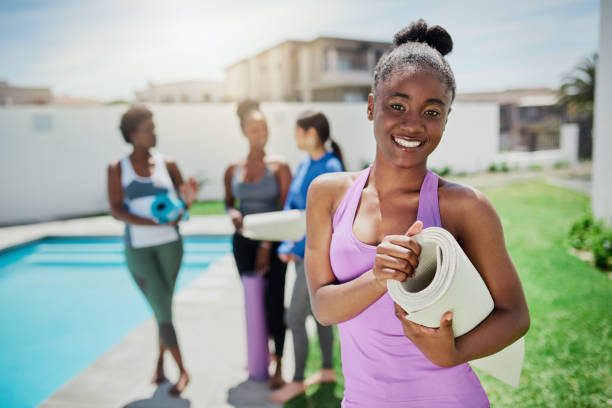 istock It's hard not to be happy at yoga class 1190215731