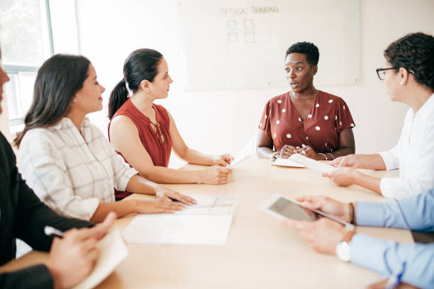 istock Business people in a boardroom 1190216745