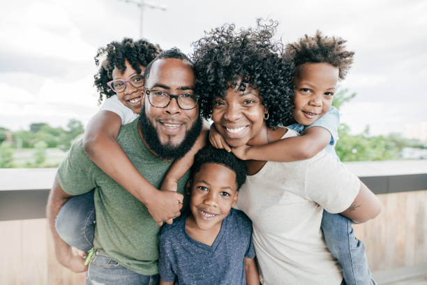 istock Two parents and three kids 1190216759