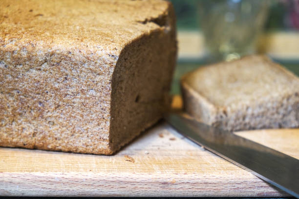 istock freshly baked bread on a wooden chopping Board 1190219789