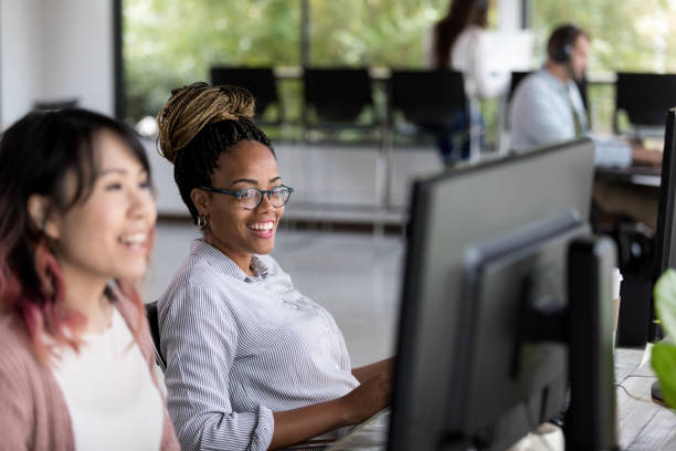 istock Cheerful business colleagues working together 1190223216