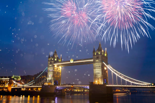 istock Famous Tower Bridge in the evening with fireworks, London, England 1190223338