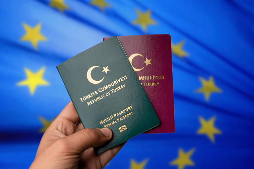Front view of Turkish passports over  Europe union flag