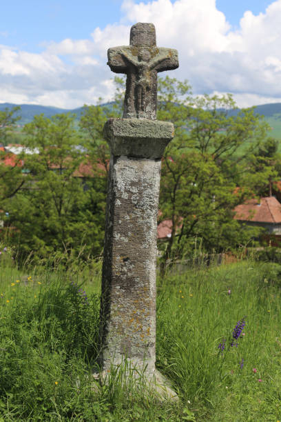 istock Jesus Christ sculpture on a medieval stone cross 1190224771