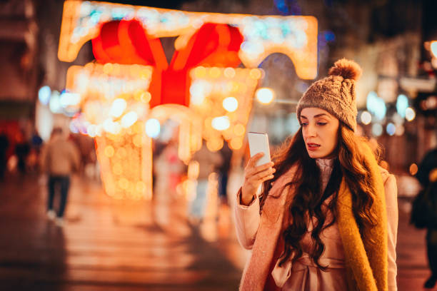 istock Woman using phone in  outdoors 1190226383