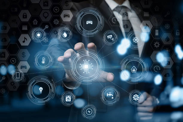 istock Businessman holds out his hand to the devices management system 1190227126