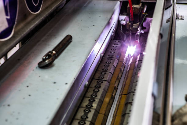 istock Working overlap arc welding machine. Welded seam. Welding sparks. 1190227236