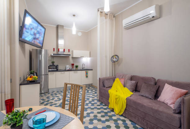 istock Modern interior of light studio apartment. Living room and kitchen. 1190227505