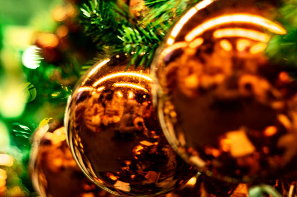 istock Red balls - toy hang on Christmas tree. Soft selective focus. Bokeh 1190227899
