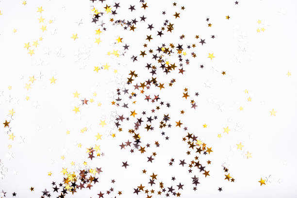 istock Golden and silver stars on white background. 1190233540