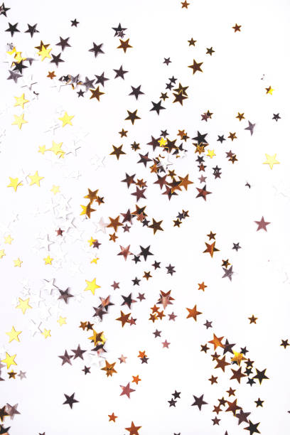 istock Golden and silver stars on white background. 1190233550
