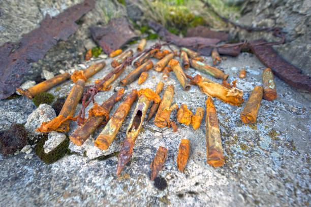 istock Rusty fragments, bullets in a dugout 1190235111