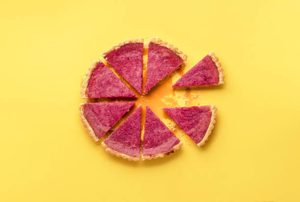 istock Cut cranberry pie and two pie slices separated. Berries dessert 1190235458
