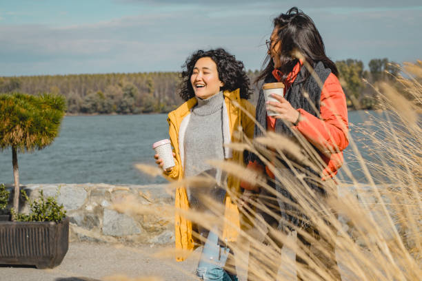istock Two Asian women enjoying in nature 1190239241