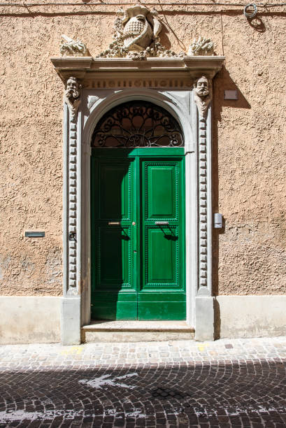 istock Typical italian facade with door.  Italian house. 1190243081