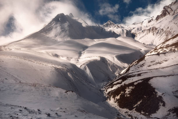 istock winter sunset over caucasus mountains 1190243144