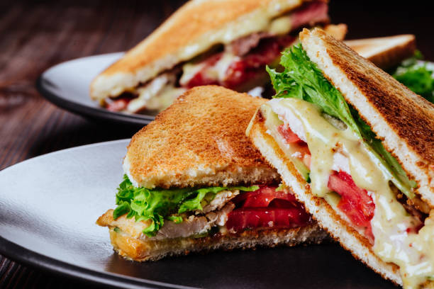 istock Sandwich bread tomato, lettuce and yellow cheese 1190248574