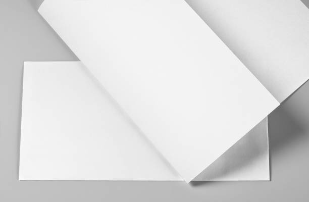 istock Blank Folded Letterhead, Sheet of Paper, or Flyer over Blank Envelope 1190252920