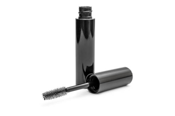 Opened black mascara on white background. Opened black mascara on white background. mascara wands stock pictures, royalty-free photos & images