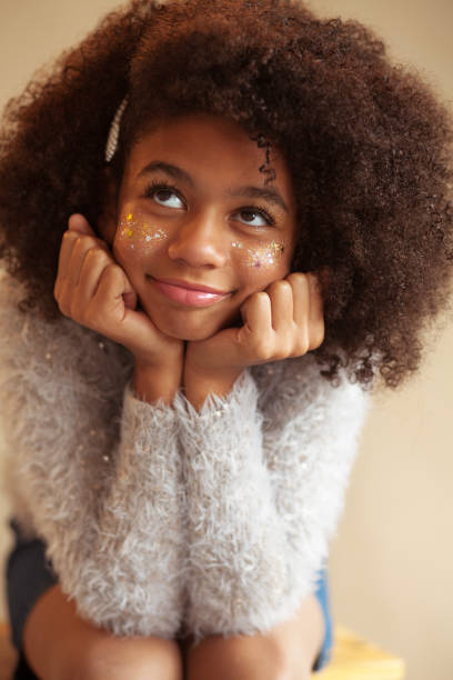istock Cute beautiful girl with shiny makeup 1190255023