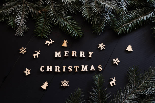 istock 'merry christmas' words on christmas background 1190260408