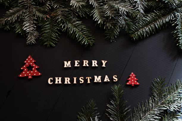 istock 'merry christmas' words on christmas background 1190260471