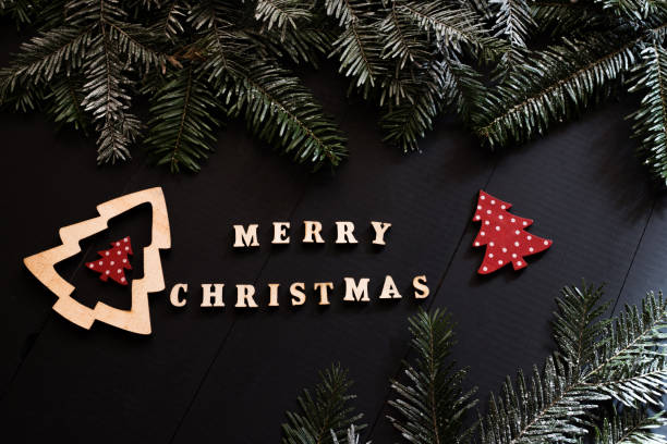 istock 'merry christmas' words on christmas background 1190260485