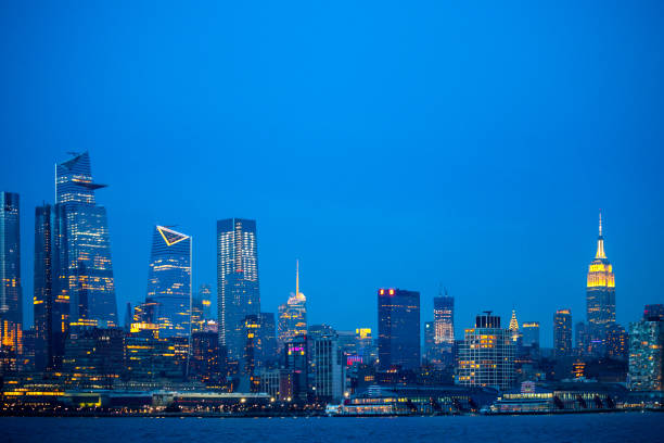 Manhattan view after sunset, seen from New Jersey.\nNew York City, USA
