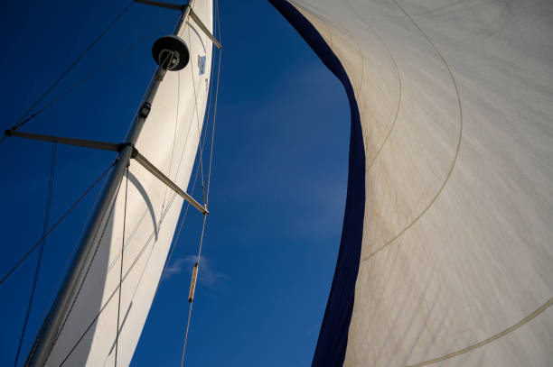 istock Sailboat mast with sails deployed against the sky in Spain 1190272975