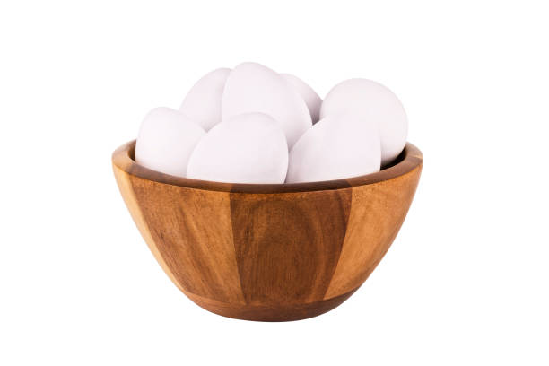 istock Bowl of fresh eggs isolated on white 1190283234