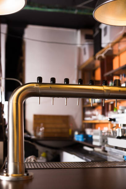 istock Image of modern beer bar with  metal beer taps 1190284385